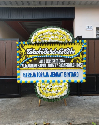Papan Bunga Duka di Moro