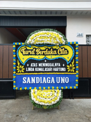 Papan Bunga Duka di Moro